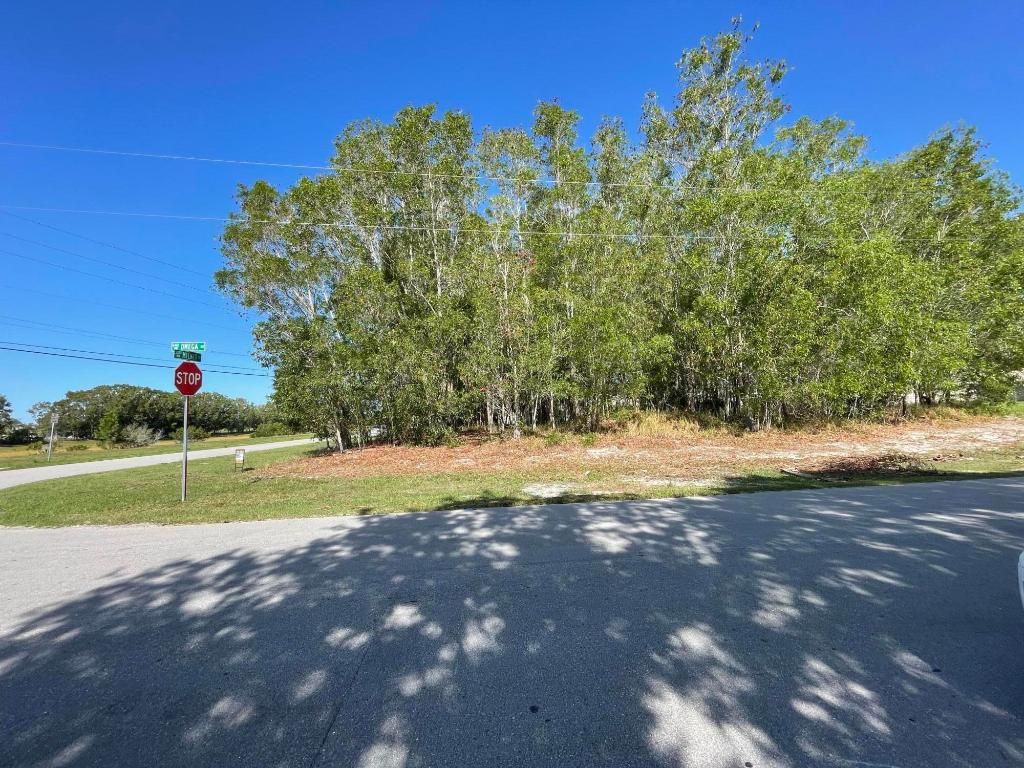 Photo of 6460 NW Omega Road, Port Saint Lucie, FL 34983 (MLS # R10991033)