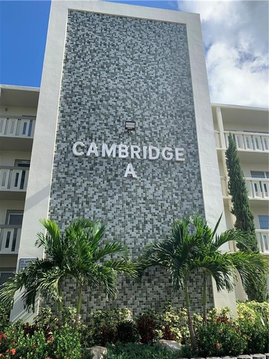 First floor one bedroom with 1 ½ bathrooms in desirable Cambridge section of Century Village. Enjoy the convenience of your parking spot right in front of your unit. Condo has been upgraded with porcelains floors, a walk in shower, mirror closet sliding doors, mirror pantry doors-- jalousie windows and French patio doors that lead to an enclosed patio area that is now a Den. Can be sold furnished or unfurnished. Easy to show. Located in a gated community with many activities in Community Clubhouse. Shuttle bus service in the village and to local markets and attractions.