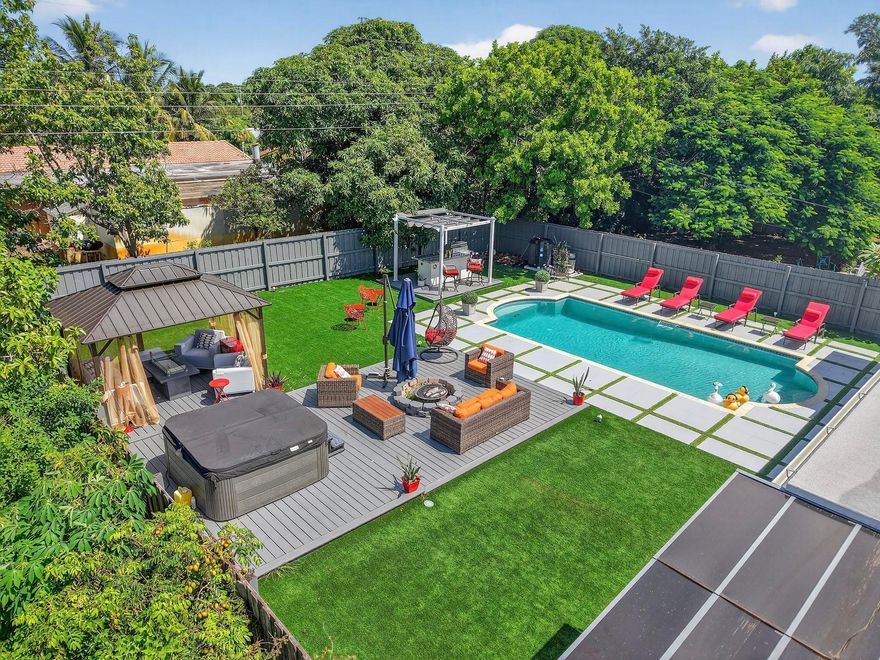 Completely renovated from top to bottom! This stunning 3-bedroom, 2-bathroom home offers modern finishes throughout and is move-in ready. Located in a desirable non-HOA community, you'll enjoy freedom and flexibility with no restrictions. The home features a private, fully fenced backyard oasis with a heated pool, fire pit, hot tub, patio for grill space, bar area and artificial grass, creating a very low maintenance outdoor space — perfect for entertaining or relaxing year-round. Conveniently situated with easy access to the freeway and just minutes from the beach, this property combines style, comfort, and prime location. Walking/Biking/Golf Cart distance from all that downtown Boynton Beach has to offer!   This property could be ideal for investors. Offered at $895,000 - cash only Furniture Negotiable.