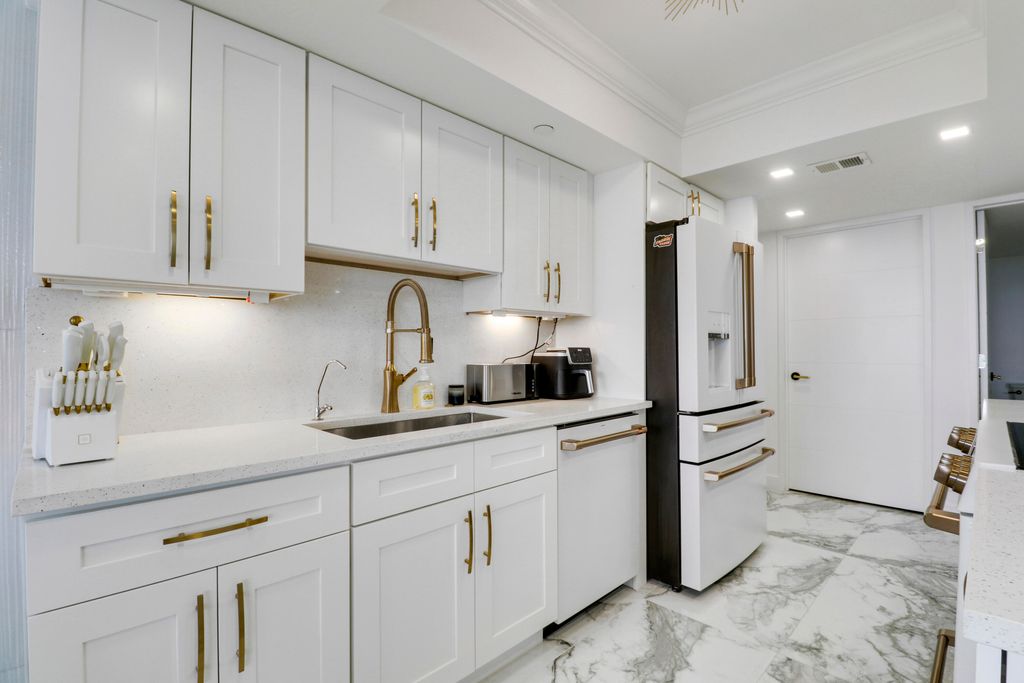 Photo of 5280 N Ocean Drive, Riviera Beach, FL 33404 (MLS # B26021696)