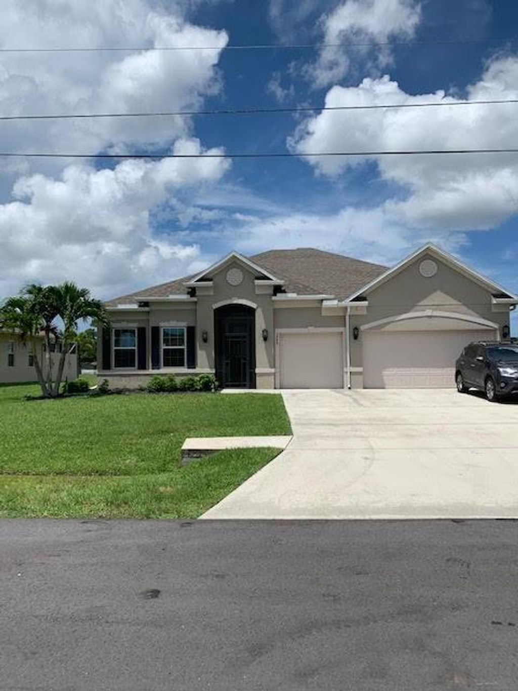 Photo of 5448 NW Edgewater Avenue, Port Saint Lucie, FL 34983 (MLS # R10736723)