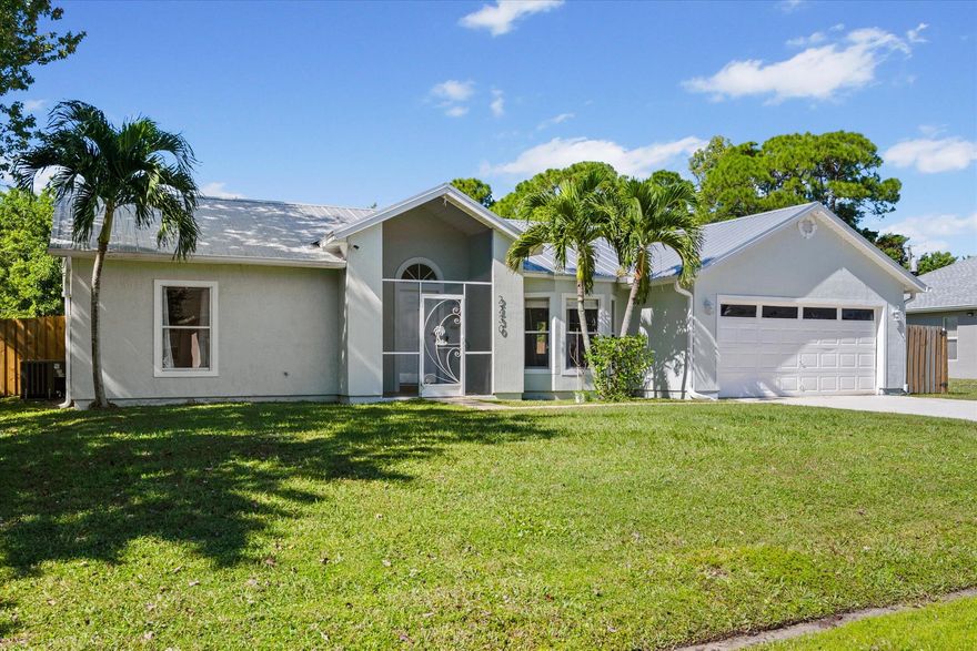 DON'T MISS OUT ON THIS BEAUTIFUL HOME IN PORT ST. LUCIE!This stunning 3-bedroom, 2-bath home features a spacious extra-large bonus room that can be used as a 4th bedroom, family entertainment area, or home office--the perfect flexible space for your lifestyle.Enjoy true Florida living with a self-cleaning PebbleTec pool, now fully fenced for added safety and privacy, and a sunblock awning creating a relaxing outdoor retreat. The large backyard is ideal for family gatherings, BBQs, and entertaining. For additional convenience, there's a 10' x 12' storage shed on site.Recent upgrades and features include:Newer roof (2021)New A/C (2021)Water heater (2017)New stucco and professional exterior paint (2021)New flooring throughout (2022)Updated kitchen wit