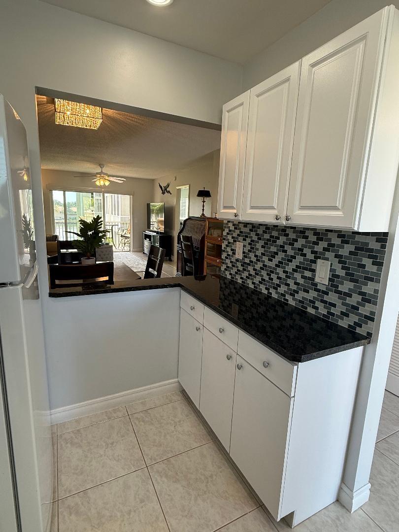 SNUG HARBOR GARDENS CONDO - Residential