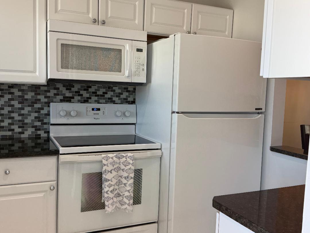 SNUG HARBOR GARDENS CONDO - Residential