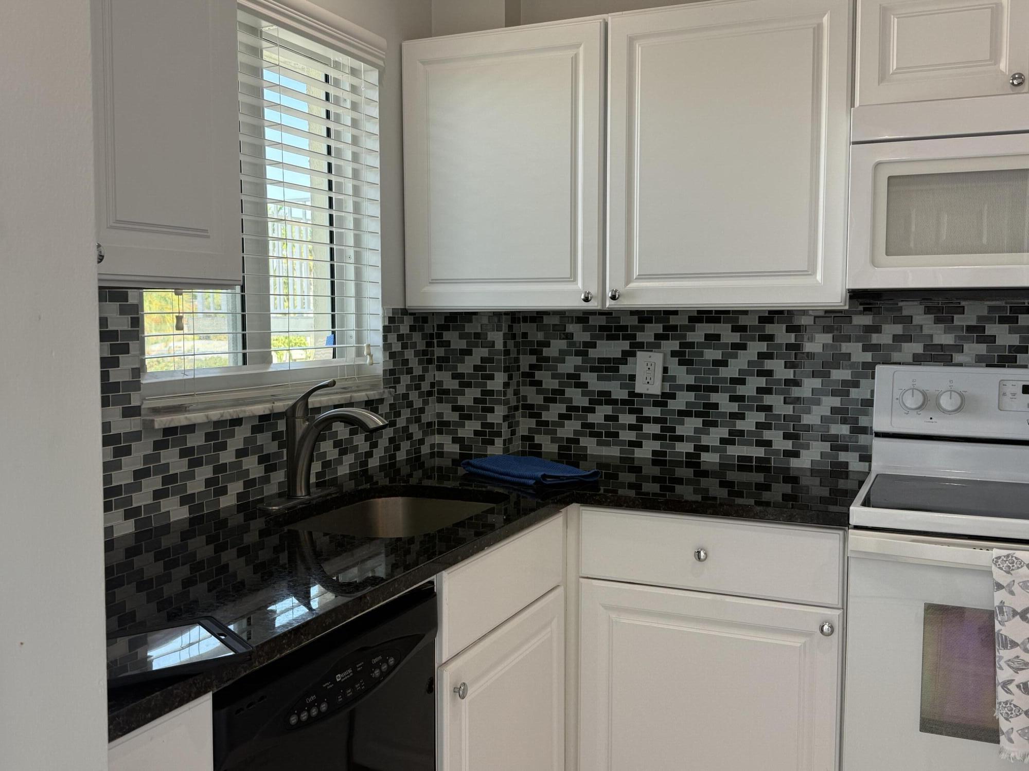 SNUG HARBOR GARDENS CONDO - Residential