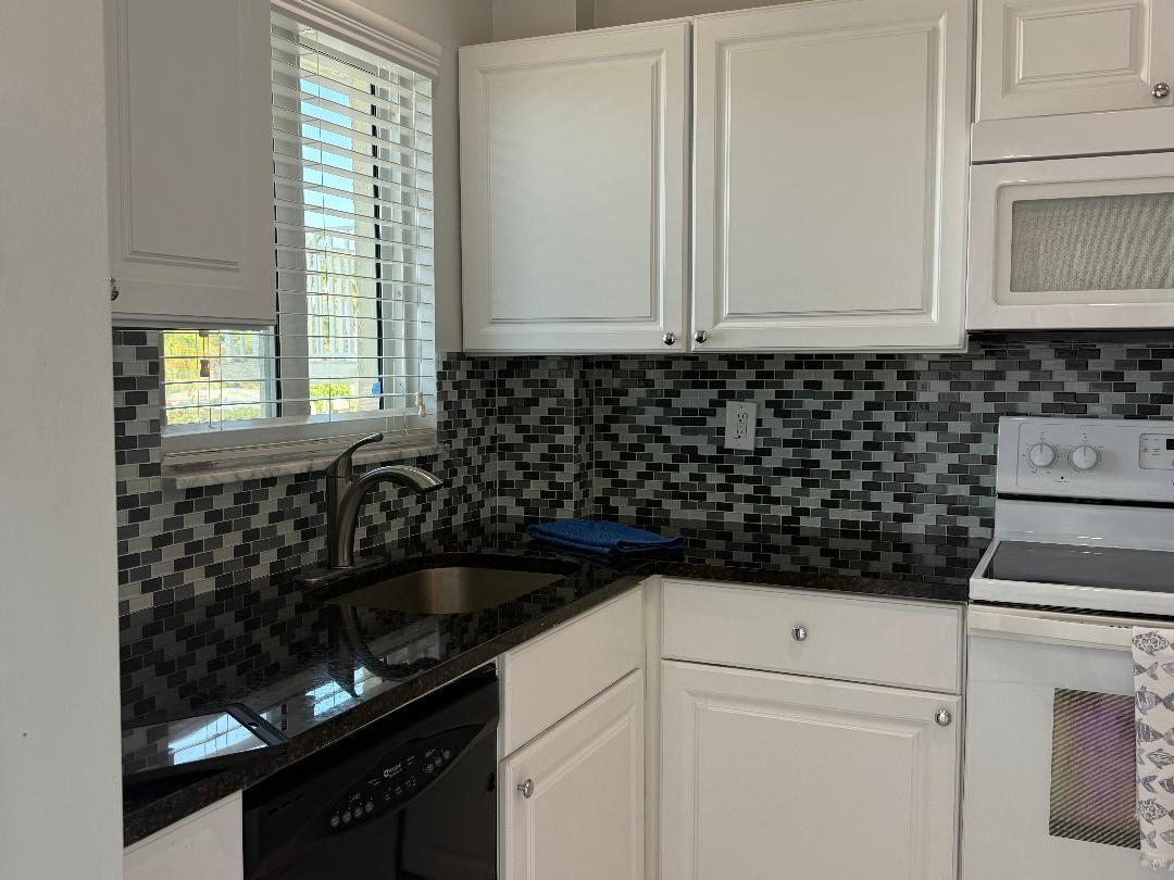 SNUG HARBOR GARDENS CONDO - Residential