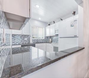 SNUG HARBOR GARDENS CONDO - Residential