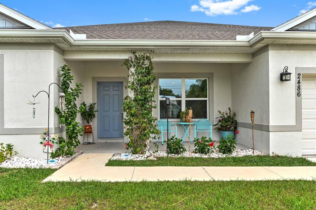 Photo of 2486 SE Burton Street, Port Saint Lucie, FL 34952 (MLS # R11096972)