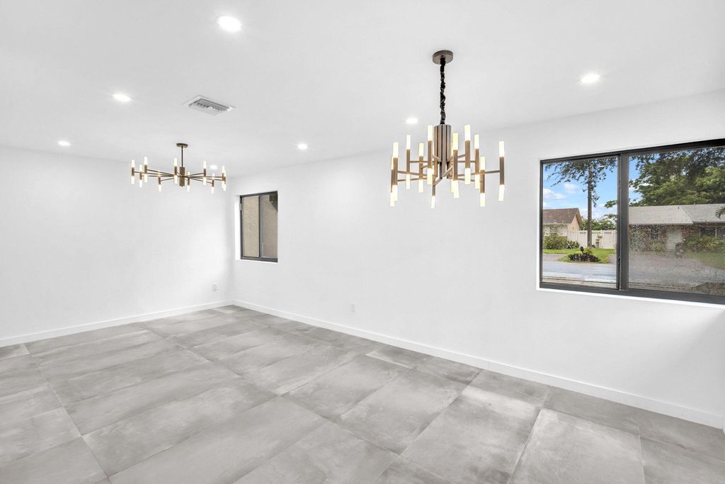 Photo of 2460 SW 58th Manor #1-2, Dania Beach, FL 33312 (MLS # B26002423)