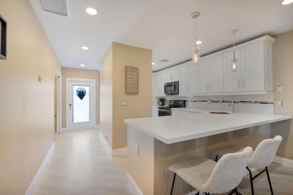 Photo of 1631 NW 18th Avenue #102, Delray Beach, FL 33445 (MLS # R11090167)