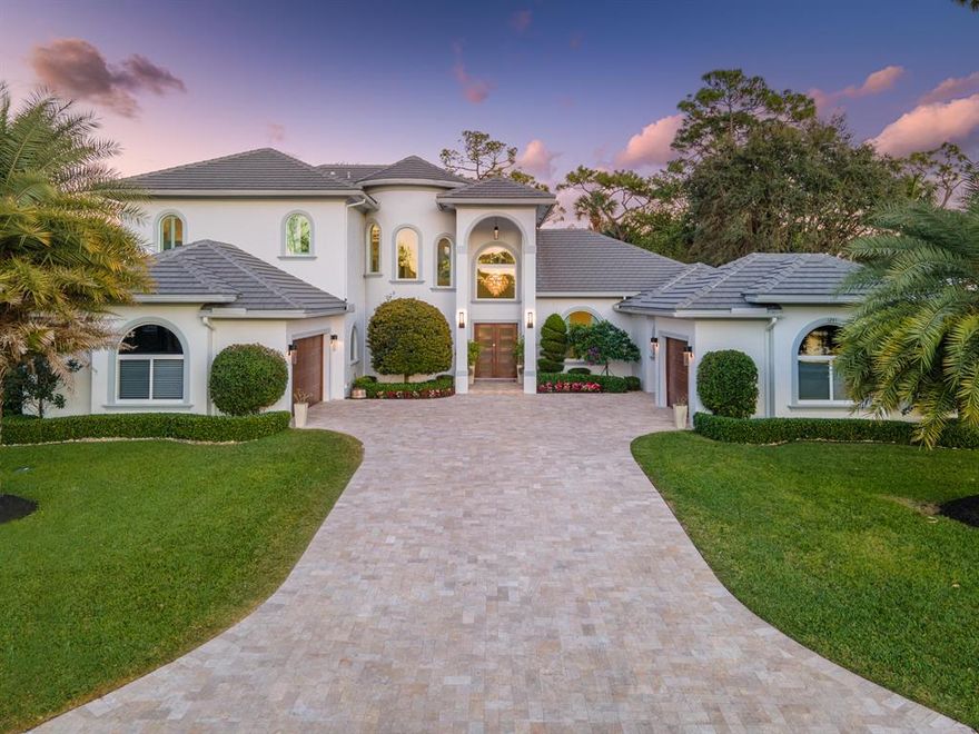 Trophy property located in scenic gated country club community of Breakers West in West Palm Beach. For the Buyer seeking all the amenities of new construction (2016), this gorgeous custom estate offers almost 5,000 SF Living Area with 5 ensuite Bedrooms + Office, 6 Full Baths, Exercise area and 2 separate garages with storage for 3 cars + golf cart. This professionally designed home welcomes you with its comfortable open floor plan, impressive ceilings with crown molding, porcelain wood tile floors, and elegant curved marble staircase.  The kitchen is an entertainer's dream with its 10ft long island, 5 burner gas range, and stunning quartzite counters and backsplash. For the wine collector, there's a temperature-controlled wine room for up to 300 bottles. The floor plan was thoughtfully