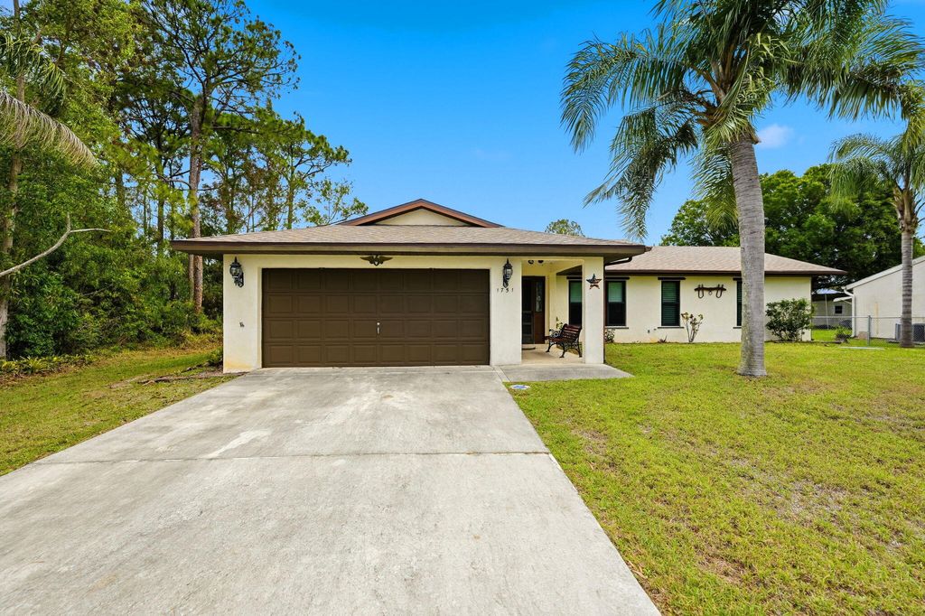 Photo of 1751 SW Tivan Lane, Port Saint Lucie, FL 34984 (MLS # B26011095)