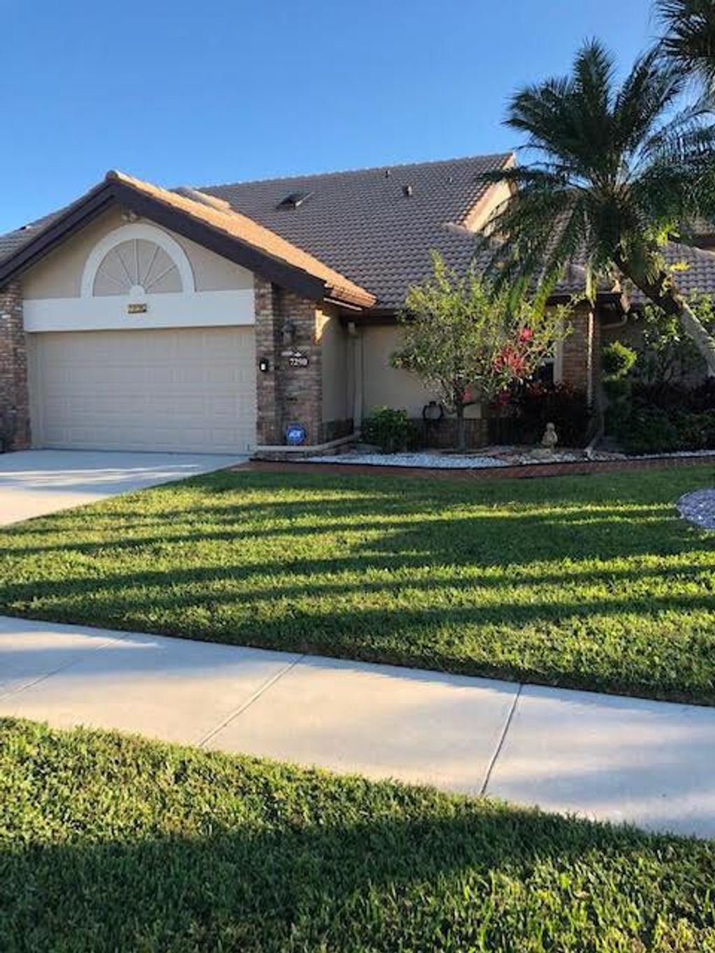 Photo of 7290 Le Chalet Boulevard, Boynton Beach, FL 33472 (MLS # R10761880)