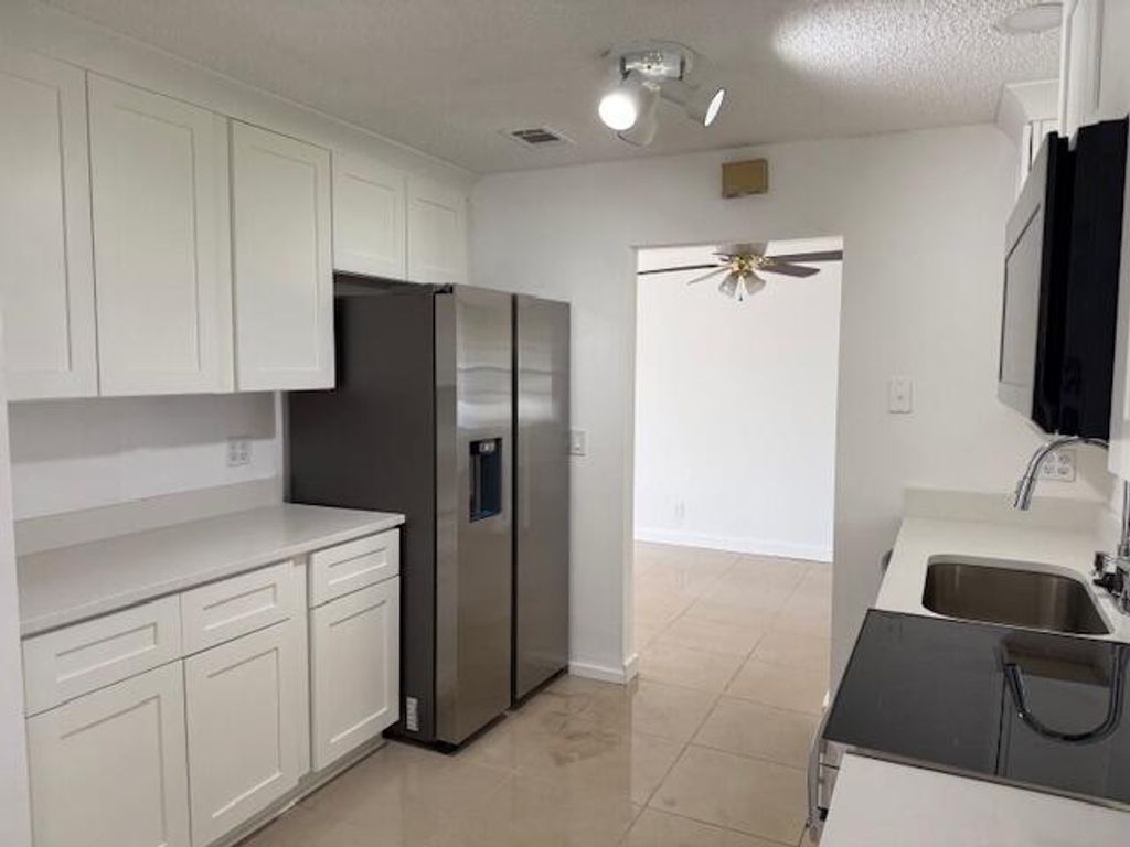 Photo of 1000 SW 16th Street, Boynton Beach, FL 33426 (MLS # R11165832)