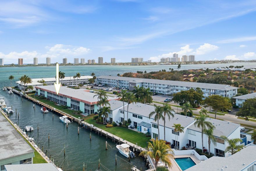 Welcome to the effortless life of coastal living in North Palm Beach, FL! This quaint waterfront 1BR/1BA condo is waiting for you. Whether as a primary residence, seasonal retreat, or investment property, this is an ideal & easy choice. Start or end your day on the spacious waterfront balcony. Features include an updated bathroom & HVAC (2024). Impact window & sliding glass doors, panels, plus roll-down shutters on the balcony for added peace of mind. Leasing is permitted once per year with a 3-month minimum. Docks are available on a first-come, first-served basis at $2.00 per foot & can accommodate boats up to 30ft. Close to shopping, dining, medical services, beaches, world class fishing, & championship golf courses. Furniture is negotiable. Pet-friendly with restrictions. Roof 1/2025.