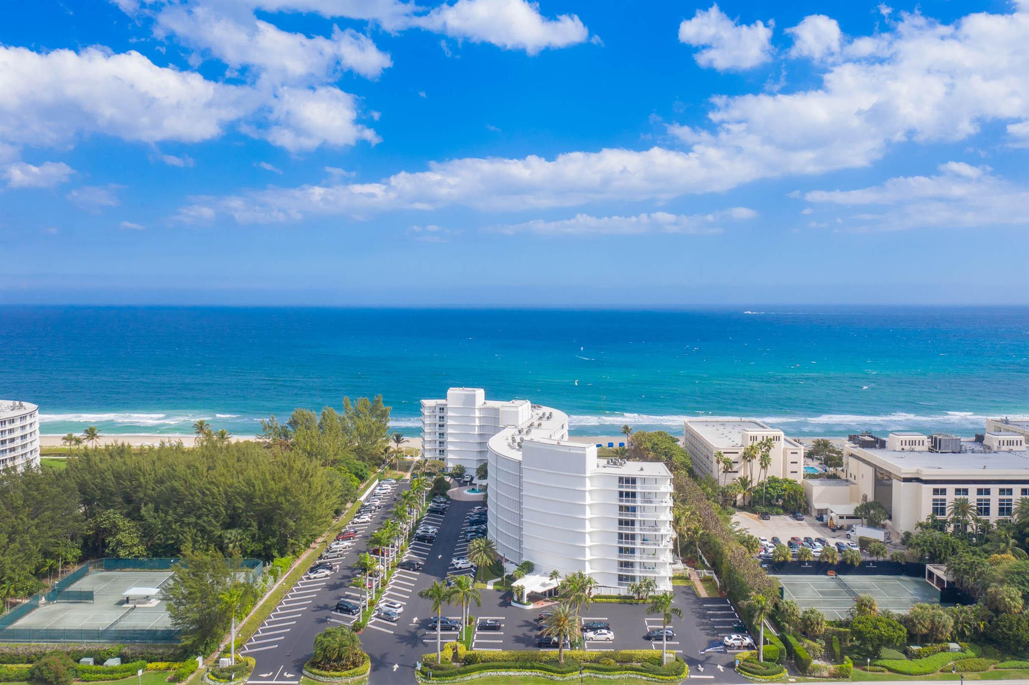 Enjoy breathtaking ocean and intercostals views from every room in this renovated 2 bedroom corner unit at the prestigious Ambassador II. Located next door to the Four Seasons on Palm Beach Island, this light filled unit offers direct access to one of the most beautiful beaches on Palm Beach along with 24/7 door person, a split floor plan, marble floors, walk in closets, en-suite dryer, and two furnished terraces; one, ocean-facing for morning coffee and a second Intercostals facing terrace to enjoy stunning sunsets. Building amenities include newly-renovated hallways, assigned parking, fitness center, party room, barbecue, sauna, high speed fiber optic cable and internet. This is a must see!