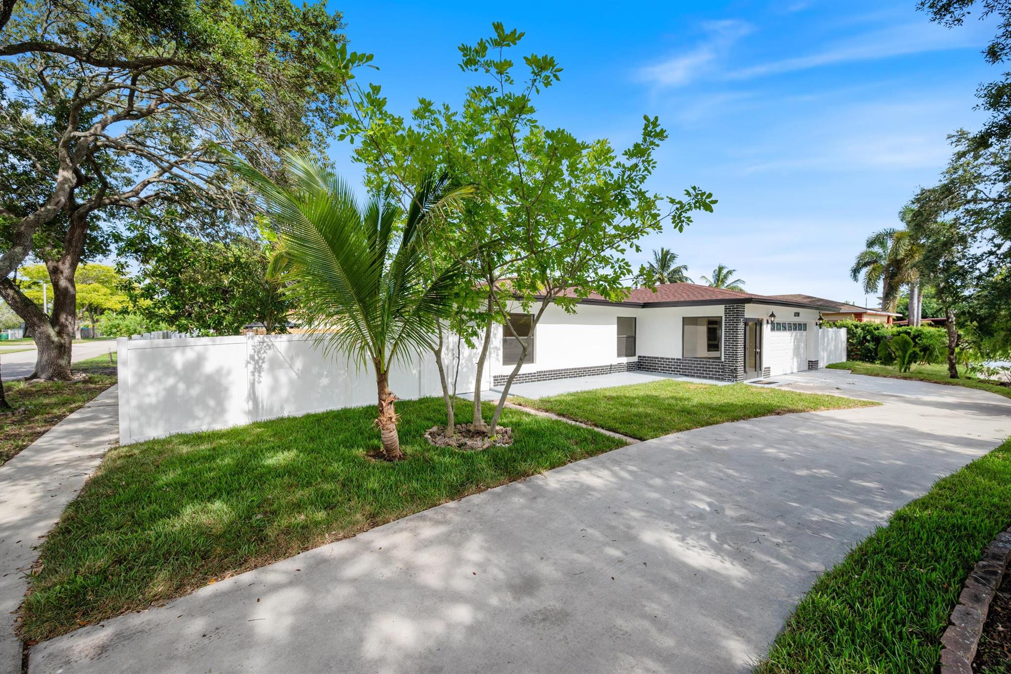 FULLY RENOVATED 4-BED, 3-BATH CORNER LOT HOME WITH IMPACT GLASS, 2-CAR GARAGE & CIRCULAR DRIVEWAY!This 2271 sq ft under air / 2,800 total sq ft home has been completely updated with NEW FLOORS, MODERN KITCHEN & BATHROOMS, RECESSED LIGHTING, and IMPACT WINDOWS & DOORS throughout. The split floor plan offers flexibility for families, guests, or a home office. Sitting on a SPACIOUS CORNER LOT, the property features a LARGE FENCED YARD, CIRCULAR DRIVEWAY, 2-CAR GARAGE, and LOW HOA of $145 ANNUALLY. Roof 2021.Investor-friendly--can be rented immediately for annual or seasonal. Quiet street, tons of natural light, and completely move-in ready! Property is professionally staged, and furniture is available for sale. Community has Olympic size pool, 2 playgrounds, tennis and basketball courts.