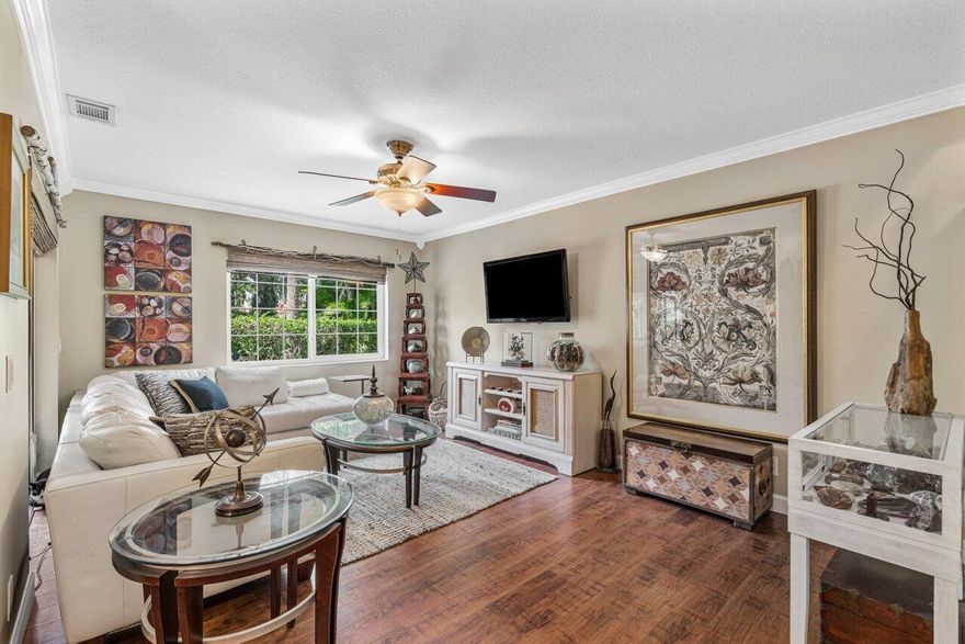 Exceptional town home in the manned gated non mandatory membership country club community of Boca Pointe possessing ALL the desired features in a Florida home! 3 bedrooms 2 and half baths. Upgraded designer grade kitchen with granite and stainless, opening to the dining area and living space with a peninsula island. Living spaces all have wood like laminate flooring, no carpet. All bathrooms are upgraded. Walk in closets. Impact windows (except sliders to the patio).  This corner home has extra windows and a huge screed private patio with an extra outdoor storage room .  Full size washer and dryer are inside! Resort style community pool. Close to the best shopping, restaurants and schools.  Assigned parking with plenty of guest parking. RENTALS allowed 4 times per year  1 PET up to 25 lbs