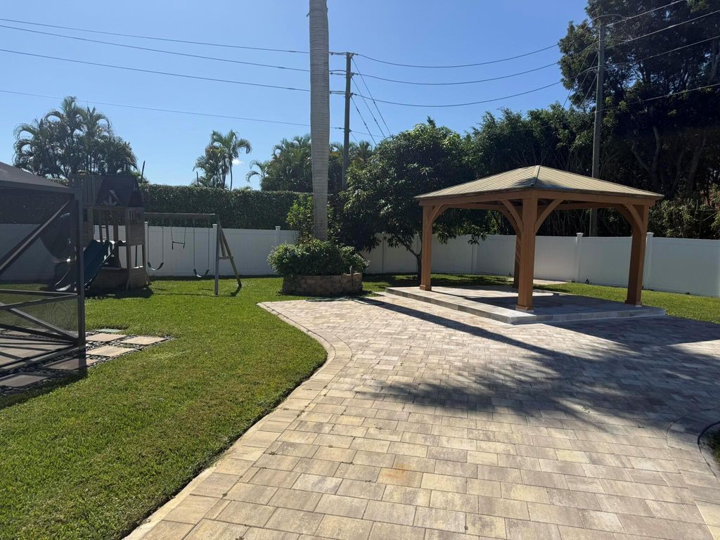 Photo of 6999 Dearborn Place, Boynton Beach, FL 33437 (MLS # R11126885)