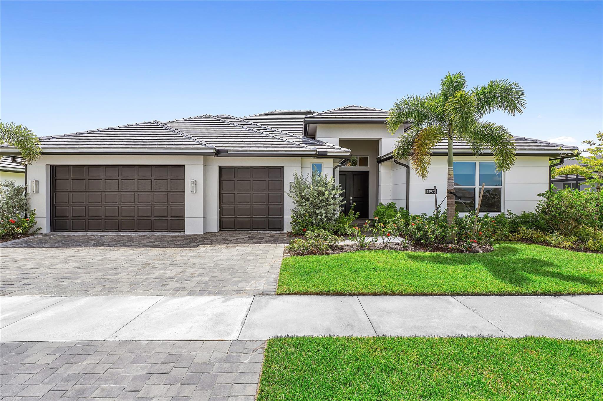 Welcome to luxury living in the heart of Tradition! Located in the exclusive gated community of Belterra, this nearly new, impeccably designed 4-bedroom, 3-bathroom home offers modern elegance and comfort across over 2,500 square feet of living space. The home showcases a bright open-concept floor plan with high ceilings, porcelain tile flooring, and custom finishes throughout. The gourmet kitchen is a chef’s dream, featuring quartz countertops, stainless steel appliances, a walk-in pantry, oversized island, and abundant cabinetry.
Belterra offers premium amenities and security. Located just minutes from dining, shopping, Cleveland Clinic, and I-95. Enjoy low-maintenance living in one of Tradition's most sought-after communities.