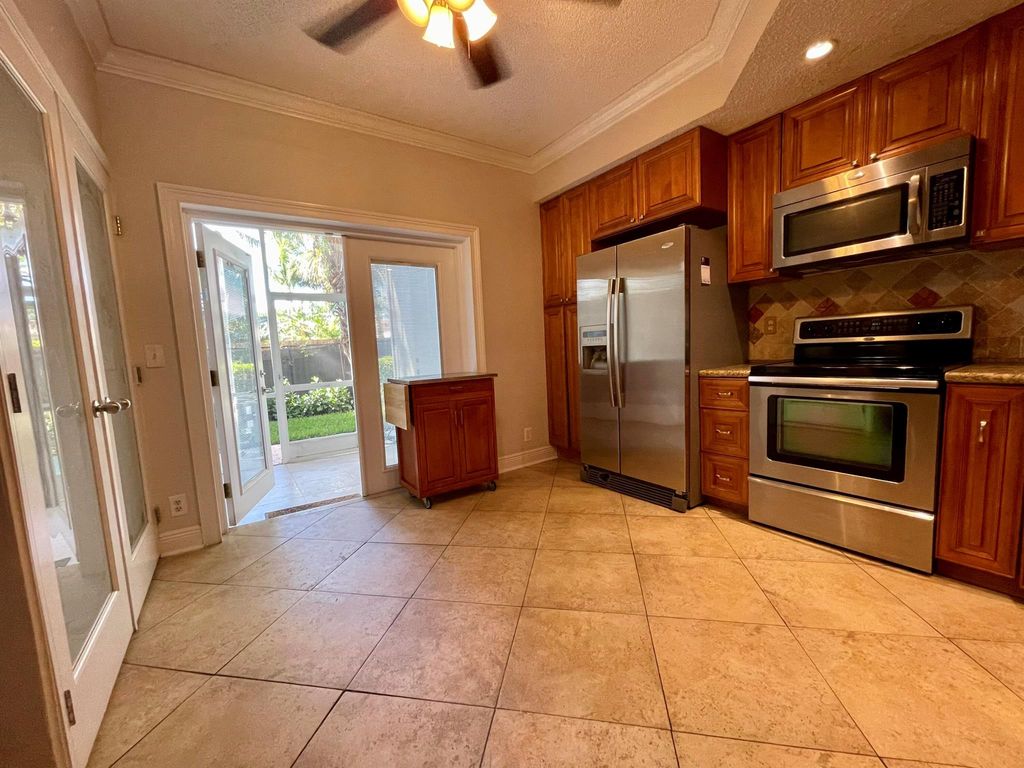 Photo of 926 Kokomo Key Lane, Delray Beach, FL 33483 (MLS # R11072719)