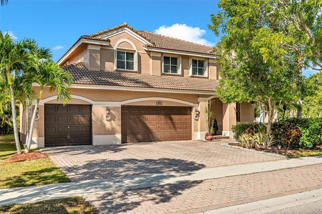 Photo of 1551 Blue Jay Circle, Weston, FL 33327 (MLS # F10546173)
