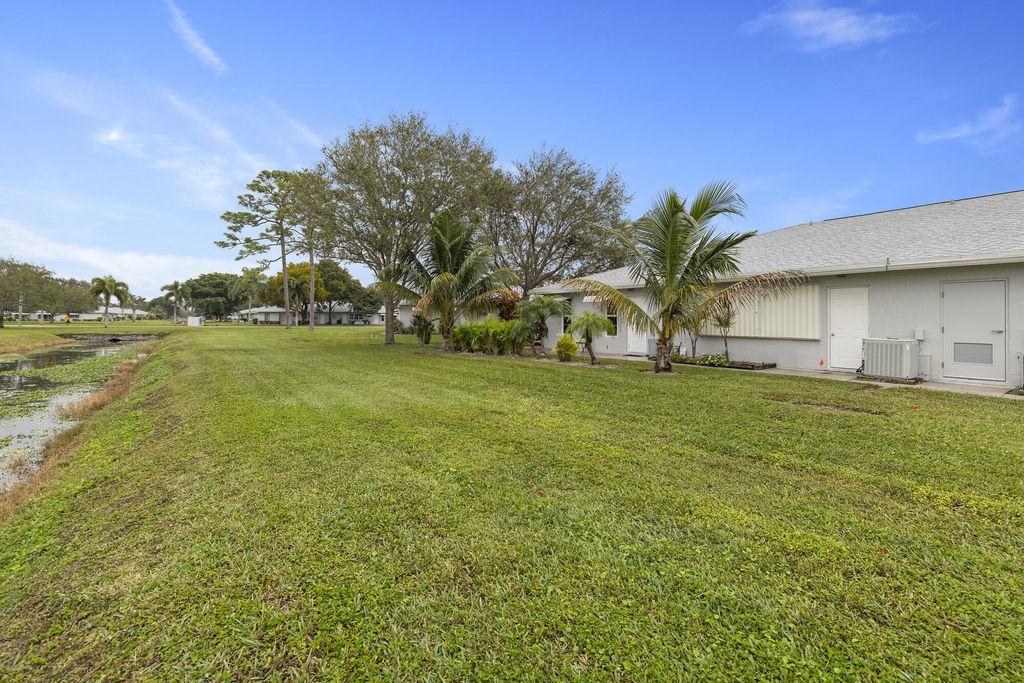 Photo of 14659 Canalview Drive #C, Delray Beach, FL 33484 (MLS # R11154694)