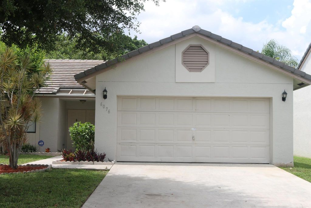 Photo of 6076 Strawberry Lakes Circle, Lake Worth, FL 33463 (MLS # R11113579)
