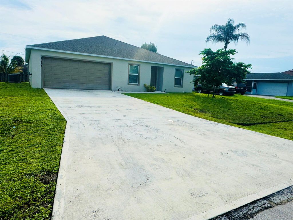 Photo of 1925 SW Flower Lane SW, Port Saint Lucie, FL 34953 (MLS # R11026687)