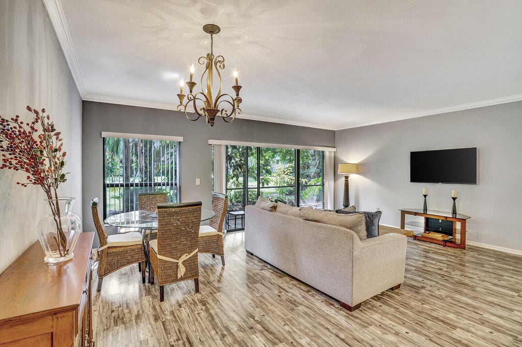 Photo of 11863 Wimbledon Circle #424, Wellington, FL 33414 (MLS # B26045276)
