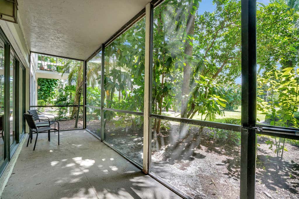 Photo of 11863 Wimbledon Circle #424, Wellington, FL 33414 (MLS # B26045276)