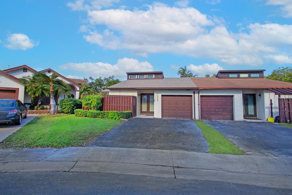 Photo of 10048 SW 16th Street, Pembroke Pines, FL 33025 (MLS # R11039025)