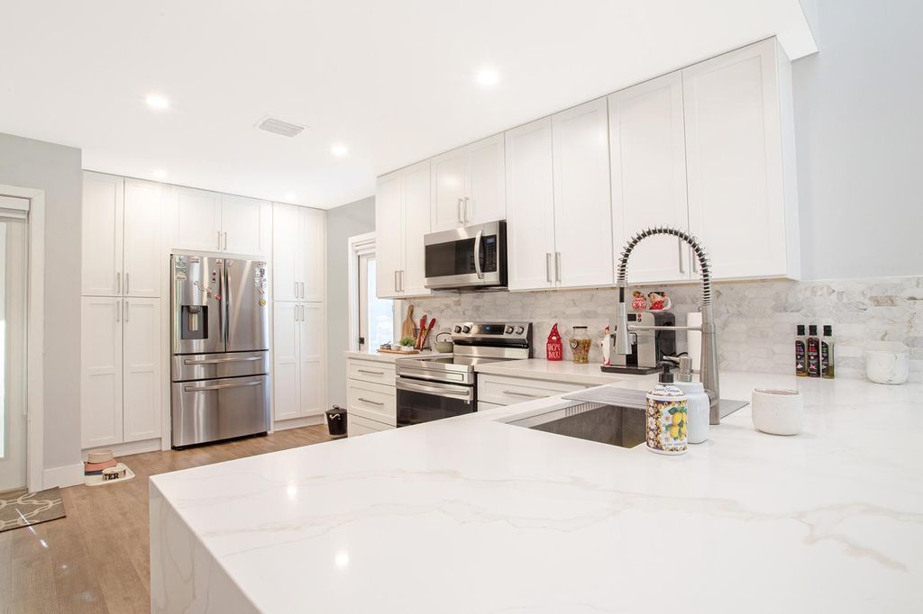 Photo of 10048 SW 16th Street, Pembroke Pines, FL 33025 (MLS # R11039025)