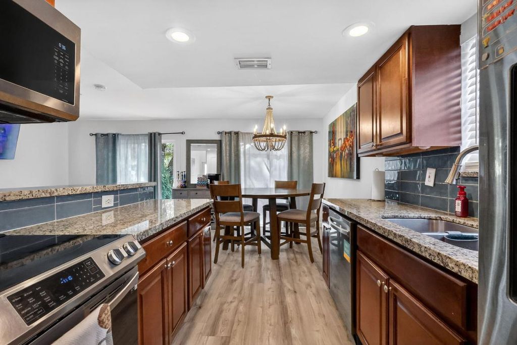 Photo of 5806 Wild Lupine Court, West Palm Beach, FL 33415 (MLS # R11138885)