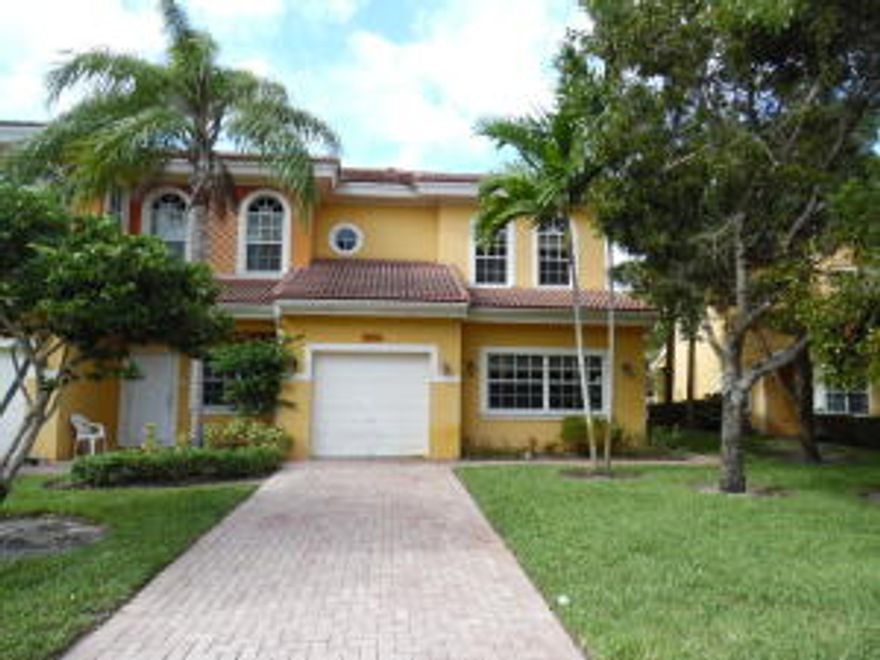 Come see this very spacious townhome in the Pinegrove community. This 3 bedroom, 2.5 bathroom home boasts over 2000 square feet of living space. It features tile flooring throughout first floor living and dining areas, recessed lighting, and updated kitchen. Clean and ready to be occupied. This property is centrally located, near major roads and highways. Schools, recreation and entertainment is a short drive away. Come make this your home. It will not last long. Sizes approx.