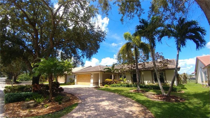 wOw! Beautiful house in Stoneman Douglas school district!! Executive home with 4 Bedroom, 2 bath, 2 car garage that has New Stainless Appliances, Granite Counter-tops, New ceiling fans, Updated bathrooms and a Newer roof! Impact hurricane windows and doors! New Energy Efficient Washer & Dryer, New Water Heater & A/C. Great circular driveway out front with a great view out back next to your pool and entertaining patio. This house will not last and there is NO HOA. Property occupied until June 1st, 2020.