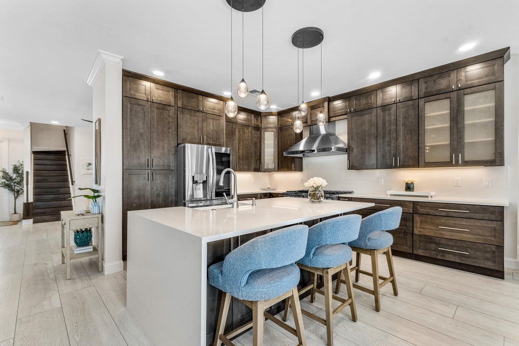 Photo of 550 Tomahawk Court, Palm Beach Gardens, FL 33410 (MLS # B26041946)