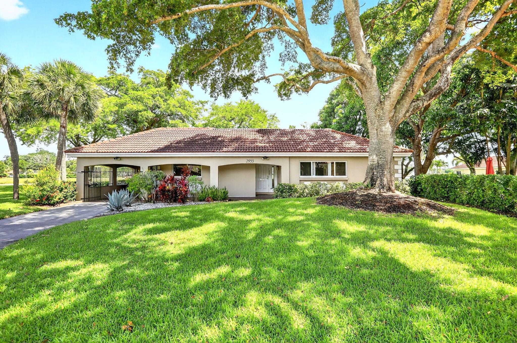 Discover this beautiful & rare VILLA nestled on a QUIET LAKEFRONT cul-de-sac, close to the beautiful community pool. Featuring 2BR, 2 BA (both ensuite), a bonus room (office space) plus a 1-car carport, providing added convenience and protection for your car during the hot Summer days + a unique private storage room most other villas do not offer. Hurricane Impact Windows & Impact rated front door & patio sliding door only. Boasting expansive and serene lake views from your dining and living area, your large open patio, or during the hot Summer days enjoy the covered, screened in patio, both offering a perfect blend of peace and tranquility. Whether you're looking for a comfortable permanent residence or a vacation getaway, this charming villa combines scenic beauty with a prime location.
