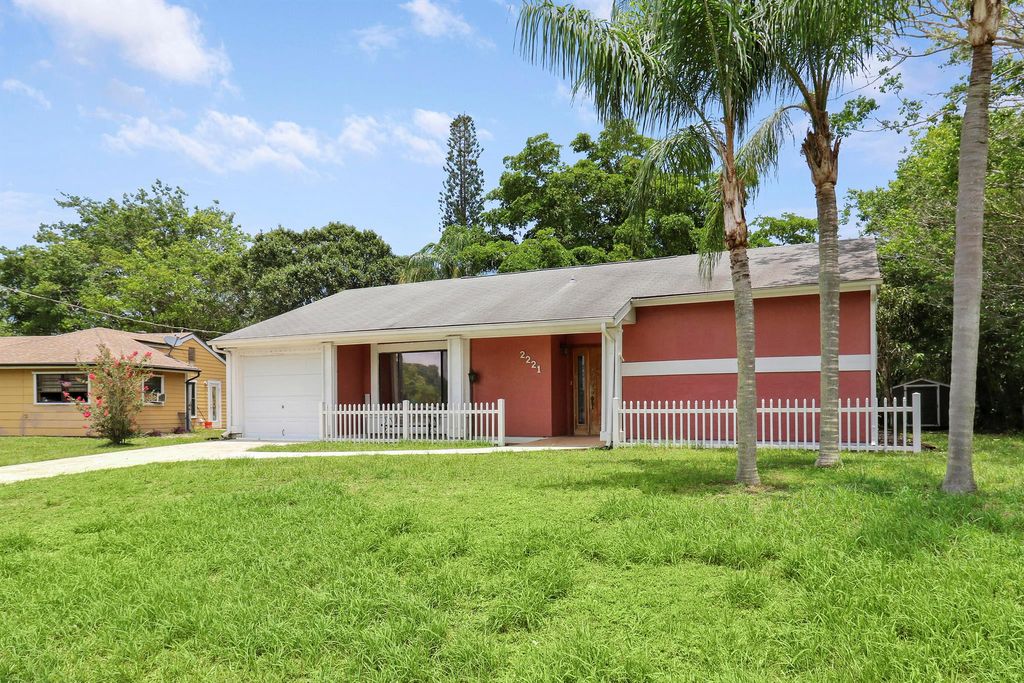 Photo of 2221 SE Monitor Street, Port Saint Lucie, FL 34952 (MLS # R10985575)