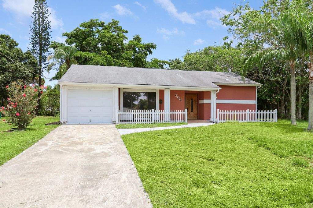 Photo of 2221 SE Monitor Street, Port Saint Lucie, FL 34952 (MLS # R10985575)