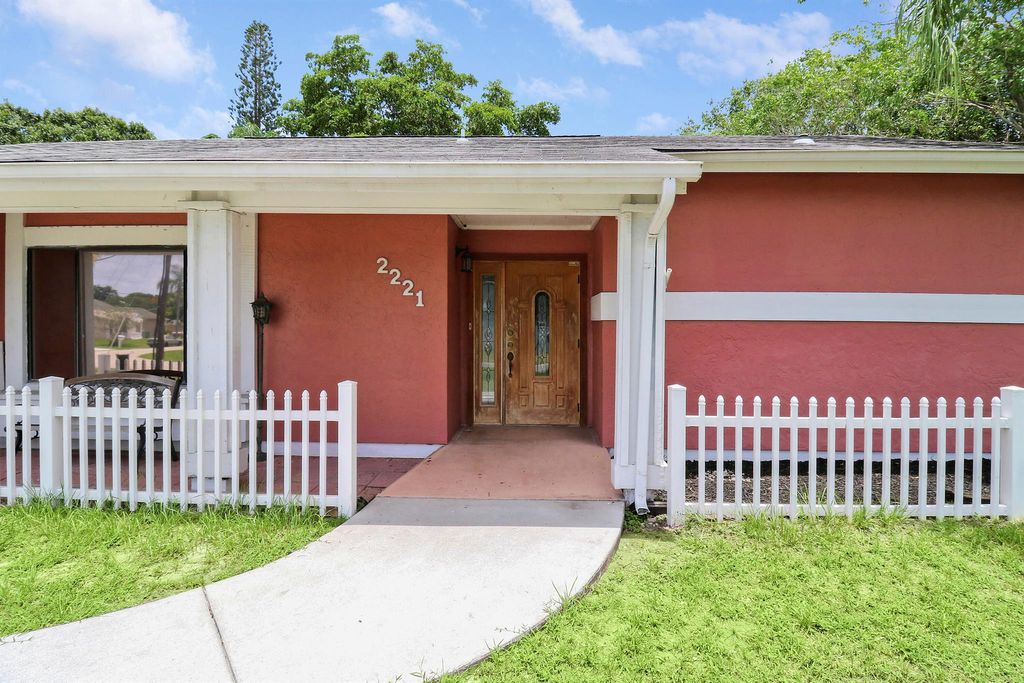 Photo of 2221 SE Monitor Street, Port Saint Lucie, FL 34952 (MLS # R10985575)