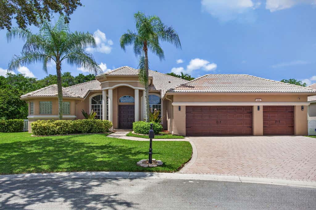 Photo of 6161 NW 53RD Circle, Coral Springs, FL 33067 (MLS # B26067780)