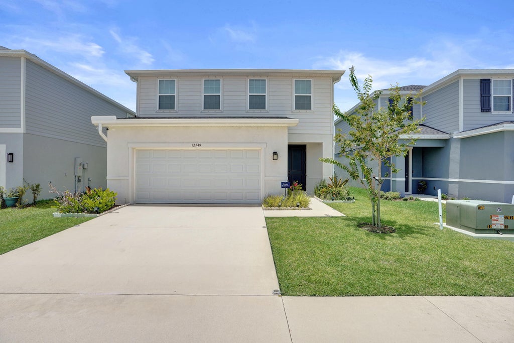 Photo of 12749 SW Orvieto Way, Port Saint Lucie, FL 34987 (MLS # B26048138)