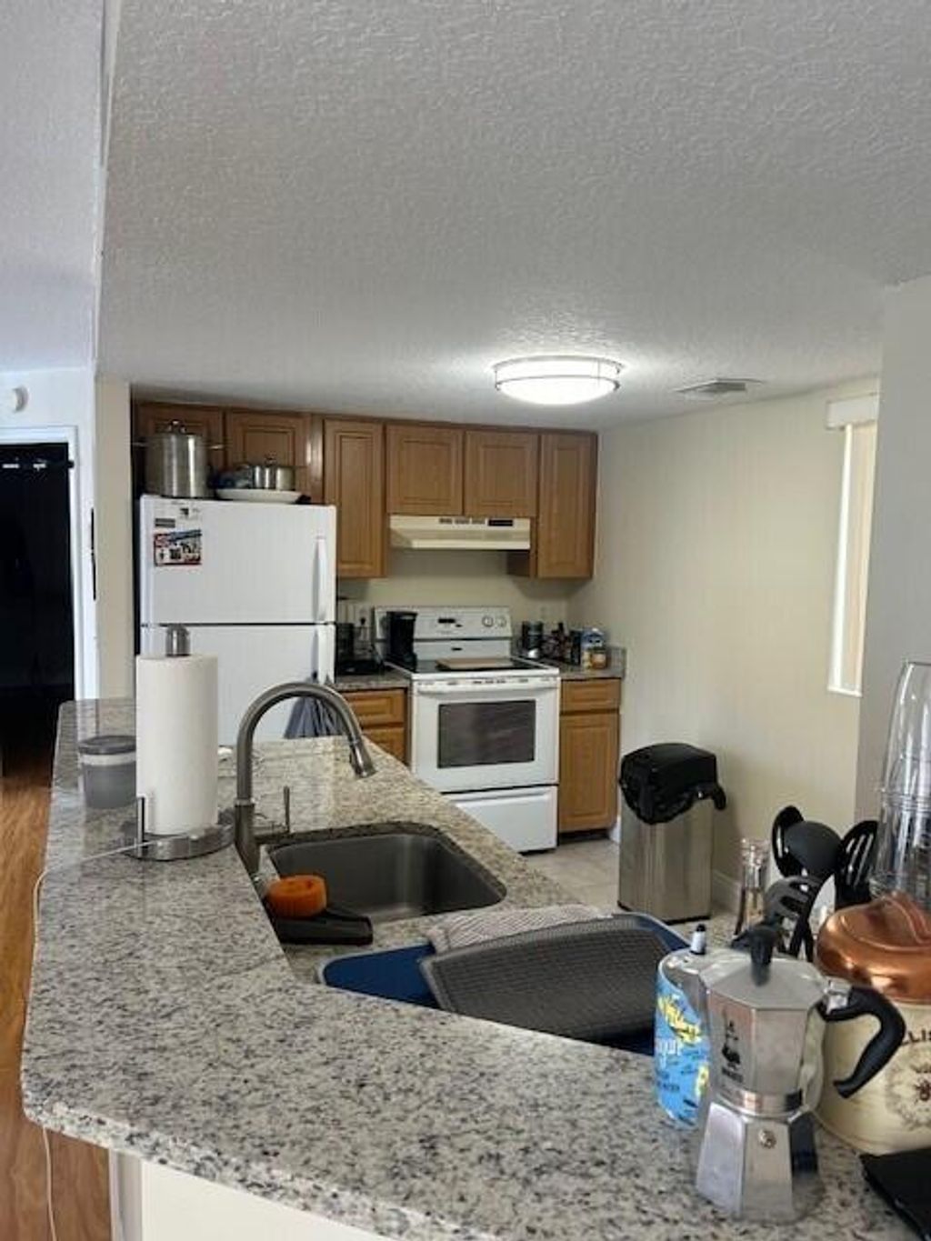 Photo of 1045 Lake Shore Drive #206, Lake Park, FL 33403 (MLS # R10971228)