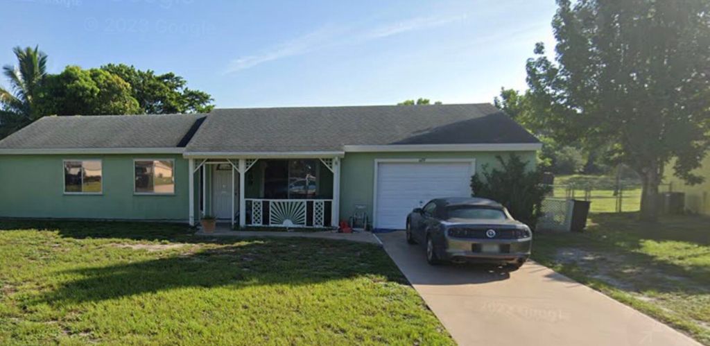 Photo of 489 SW Belmont Circle, Port Saint Lucie, FL 34953 (MLS # R10867321)