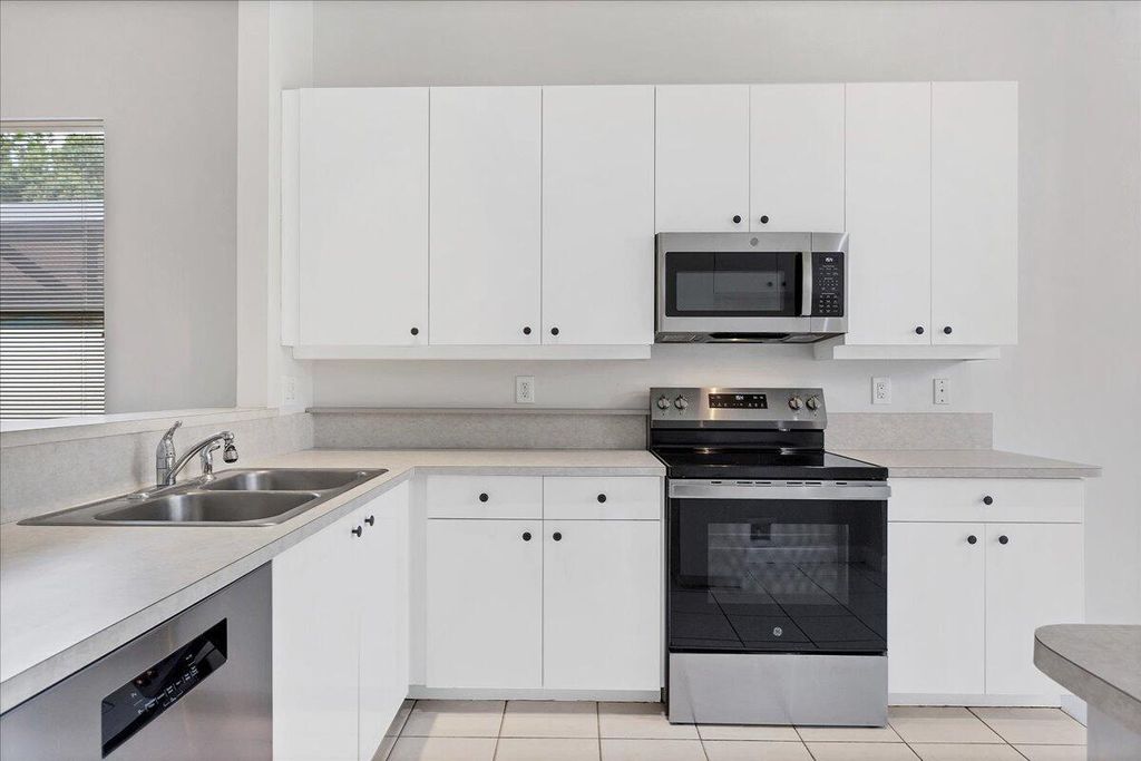 Photo of 820 SW Munjack Circle, Port Saint Lucie, FL 34986 (MLS # R11004108)