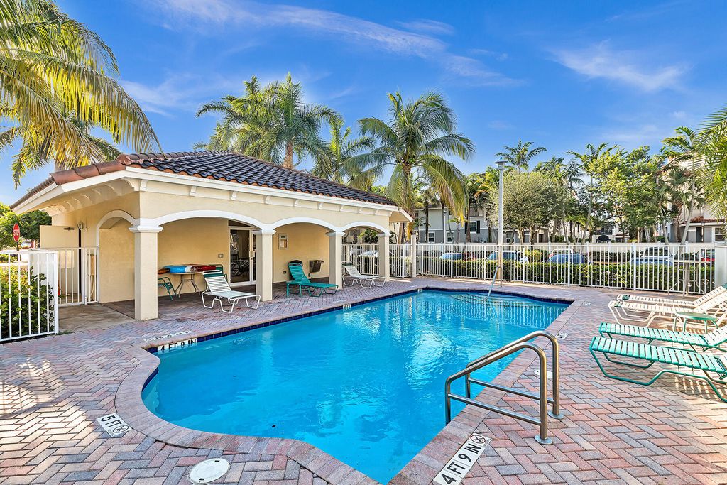 Photo of 323 Bayfront Drive, Boynton Beach, FL 33435 (MLS # B26026505)