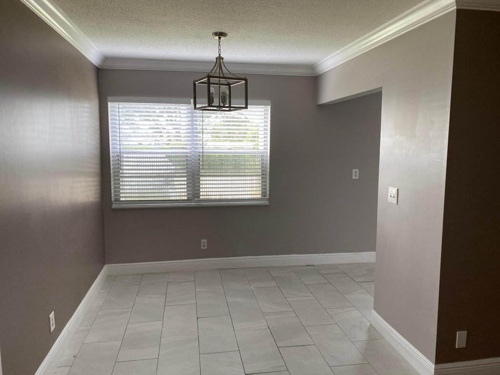 Photo of 49 WALTHAM C #49, West Palm Beach, FL 33417 (MLS # B26093888)