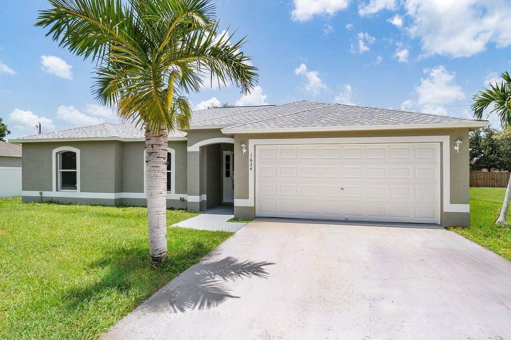 Photo of 1634 SW Cycle Street, Port Saint Lucie, FL 34953 (MLS # R10904432)