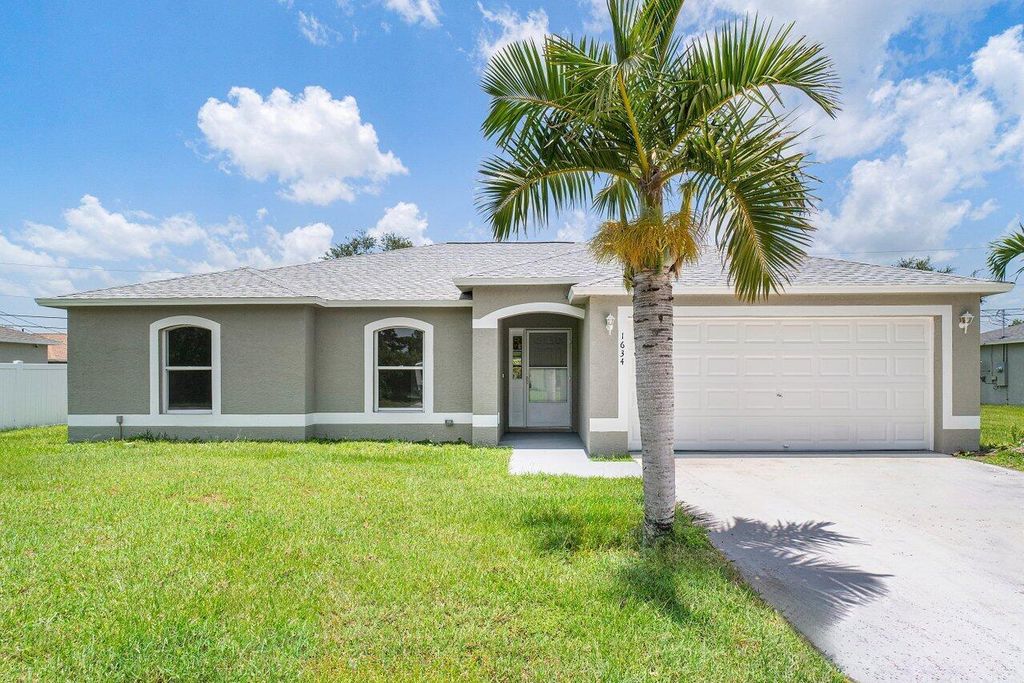 Photo of 1634 SW Cycle Street, Port Saint Lucie, FL 34953 (MLS # R10904432)